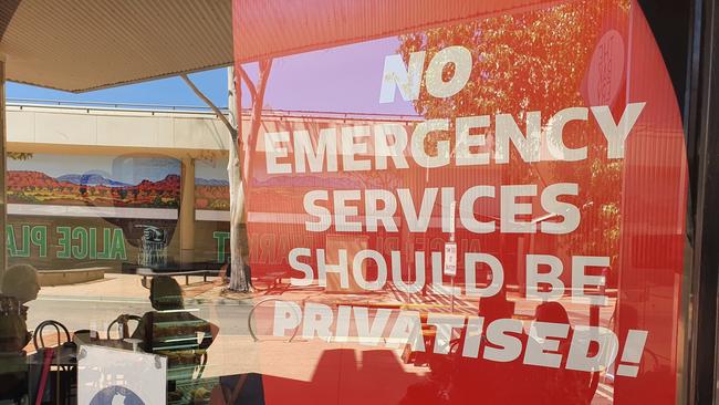 Alice Springs businesses have started putting up union corflutes in support of the paramedics who are advocating for the service to go under government.