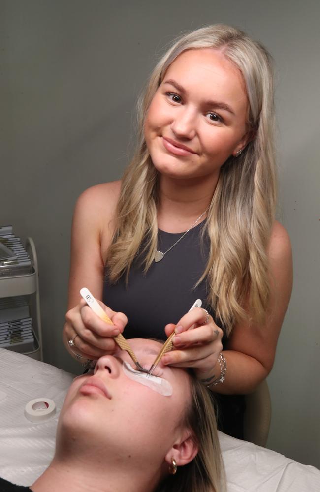 S.bbeautyy owner Shania Gibson has won the Bulletin's best eyelash technician on the Gold Coast competition. Shania at work with a client. Picture Glenn Hampson