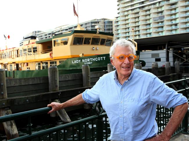 Lavender Bay artist Peter Kingston with the Lady Northcott at Circular Quay. He has long supported the push to retain the “ladies” and is known for his paintings of the older ferries. Picture: Stephen Cooper