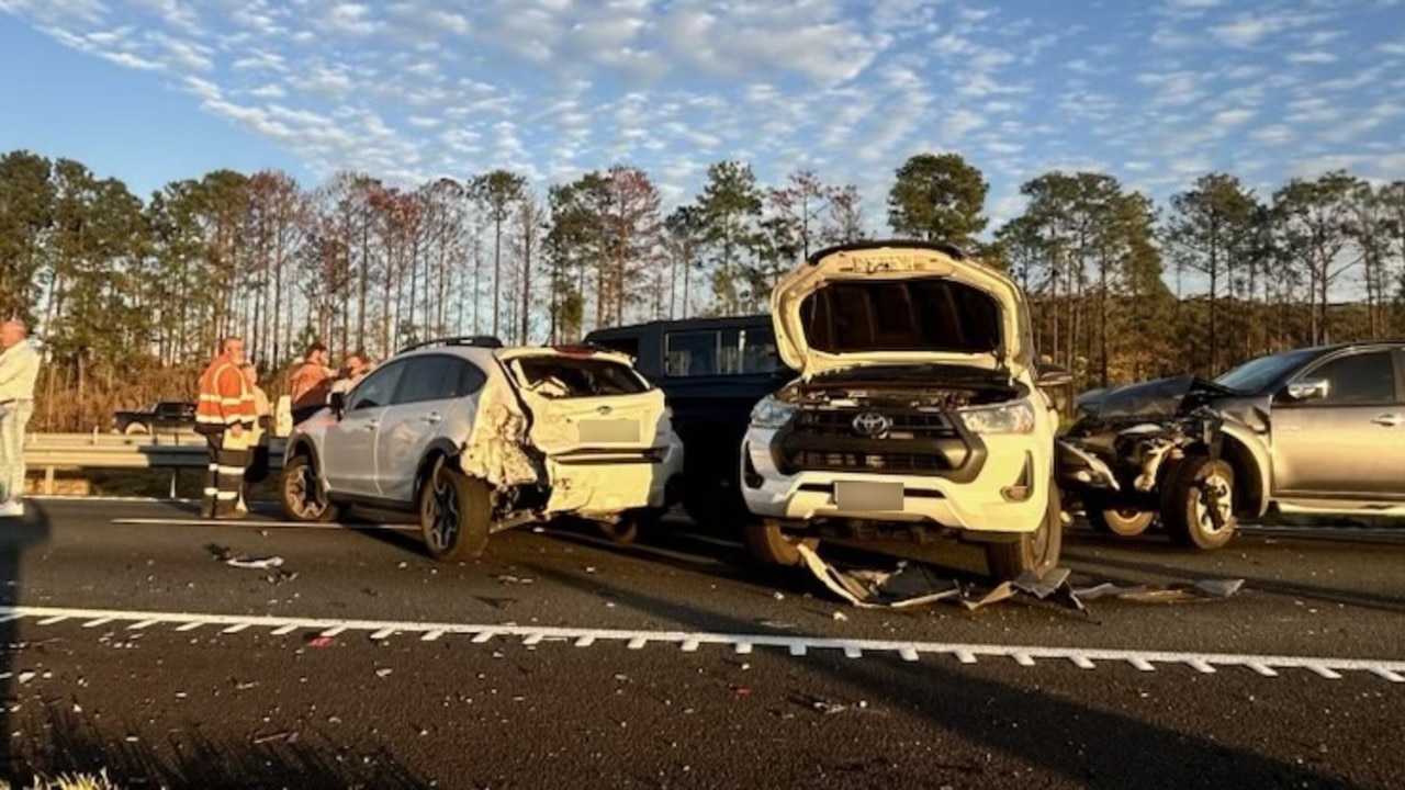 Bruce Highway reopened, woman fights for life after 12 vehicles in ...