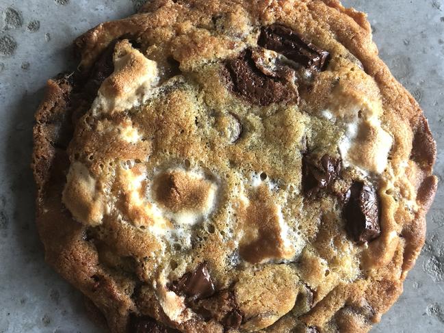 Baked At Ancora S'mores cookie is filled with chocolate chunks and marshmallows. 