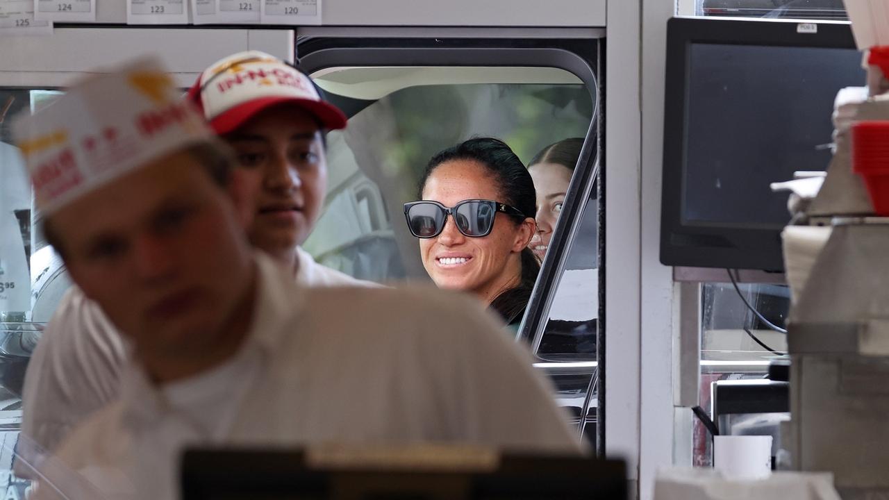 Meghan drove her Range Rover through the drive through at In-N-Out in Goleta, a few miles from her home in Montecito, California. Picture: BACKGRID Australia