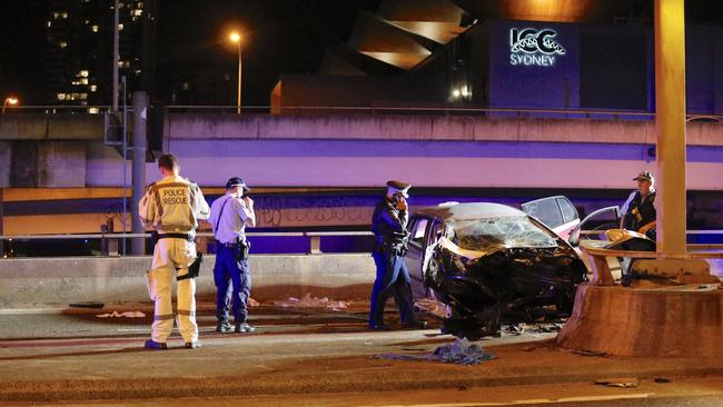 Police at the scene of the crash on Friday. Picture: Steve Tyson