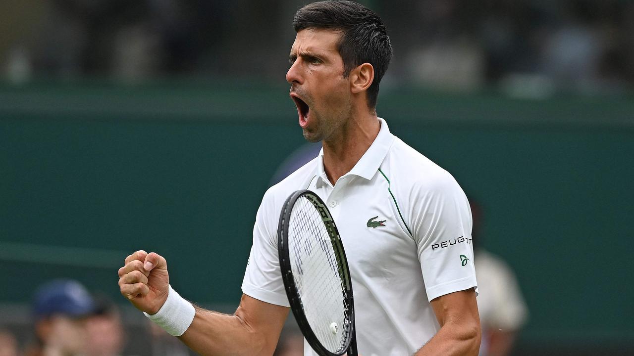 Novak is pretty happy with the outcome. (Photo by Glyn Kirk / AFP)