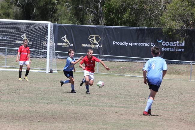 The Premier Invitational football tournament on the Gold Coast. Gold Coast Knights Red v Springfield United under-13s in action. Picture: Mike Batterham.
