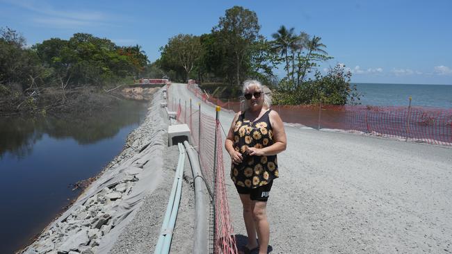 Holloways Beach resident Penny Balog standing on Casuarina St now being filled after the devastation of floods. Picture: Nuno Avendano