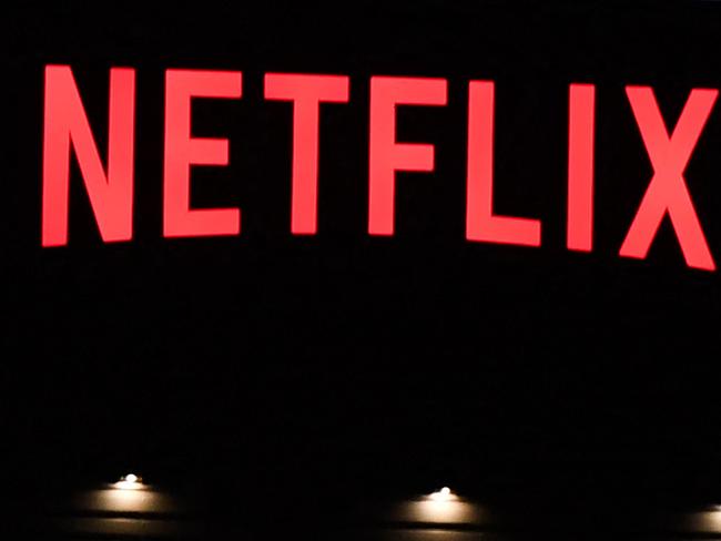 (FILES) In this file photo taken on October 19, 2021 the Netflix logo is seen on the Netflix, Inc. building on Sunset Boulevard in Los Angeles, California. - Netflix on January 19, 2023 said global subscribers to its streaming service jumped to more than 230 million people in the last three months of last year as hits such as "Wednesday" and "Harry & Meghan" drew in new viewers. (Photo by Robyn Beck / AFP)