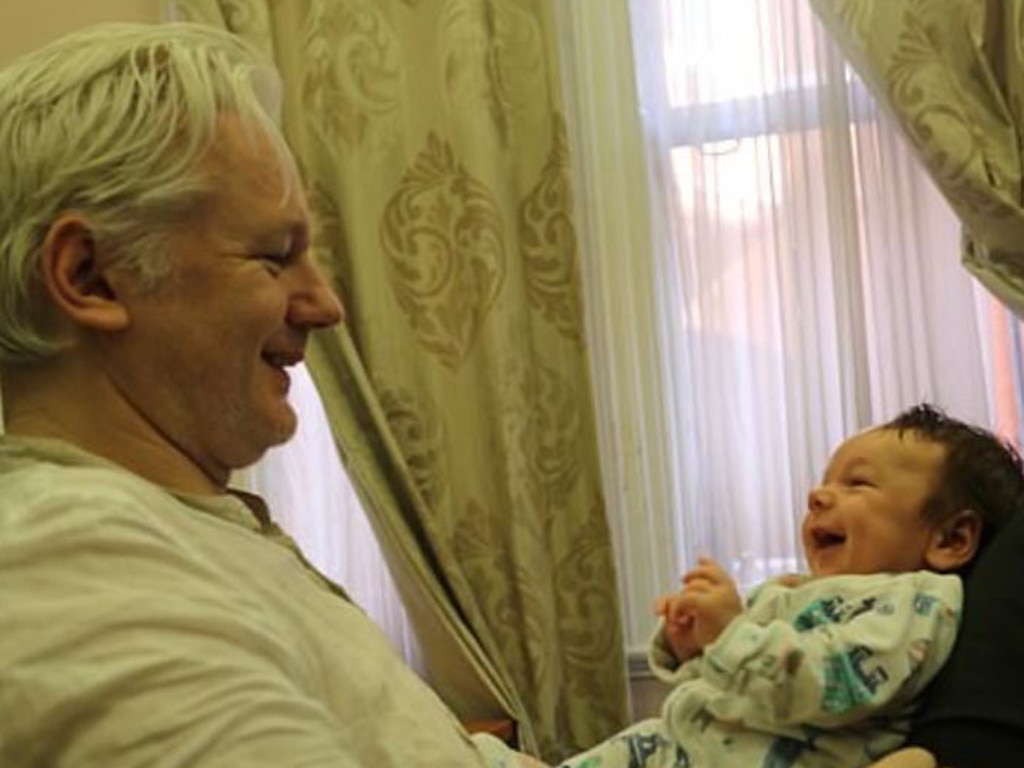 Julian Assange with first son Gabriel. He secretly fathered two sons to Stella Moris while living in the Ecuadorean embassy. Picture: Stella Moris