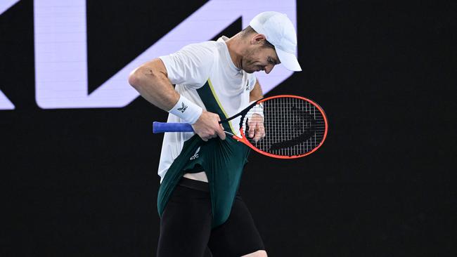 Andy Murray was hating the late finish. (Photo by WILLIAM WEST / AFP)