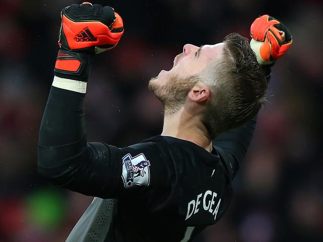 MANCHESTER, ENGLAND - DECEMBER 14: David De Gea of Manchester United celebrates the third goal during the Barclays Premier League match between Manchester United and Liverpool at Old Trafford on December 14, 2014 in Manchester, England. (Photo by Alex Livesey/Getty Images)