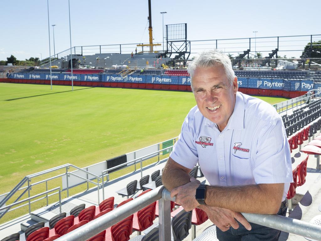 Dolphins CEO Tony Murphy poses for a photograph with the new Northern stand being constructed at Dolphins Stadium. Picture: Renae Droop