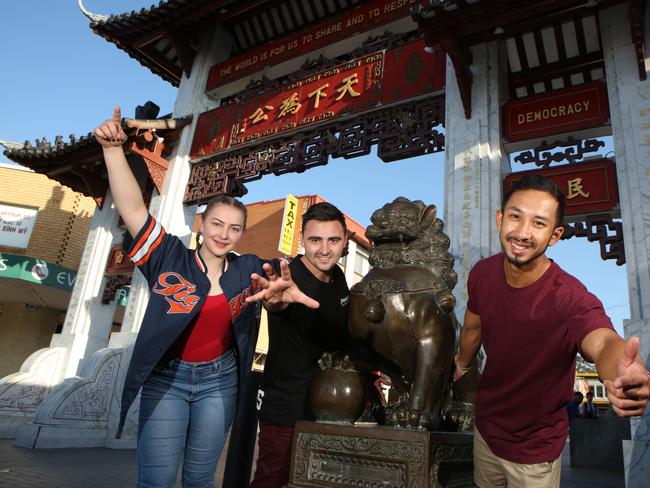 DMC performers Ivana Djakovic, Joseph Carbone and Patrick Uy pose for a photo in Cabramatta, Friday, 14th September 2018. The Dance Movement Crew will be this year's Moon Festival main event. The crew specialise in dance, parkour, acrobatics and circus stunts, including fire breathing. (AAP Image / Robert Pozo).