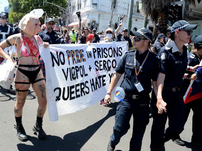 A small group of protesters clash with police who were marching in the Midsumma Pride Parade along Fitzroy Street St Kilda. Picture: Andrew Henshaw