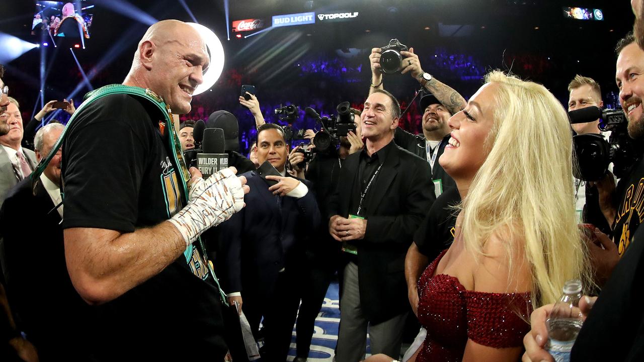 Tyson Fury sings "American Pie" to his wife Paris Fury and the fans following his win by TKO
