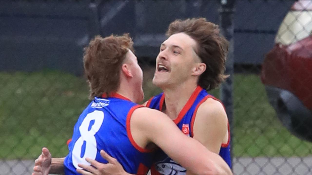 Queenscliff’s Thomas Bakker celebrates a six-pointer with Max Scott against Modewarre. Picture: Mark Wilson