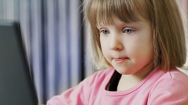 Child looking at computer