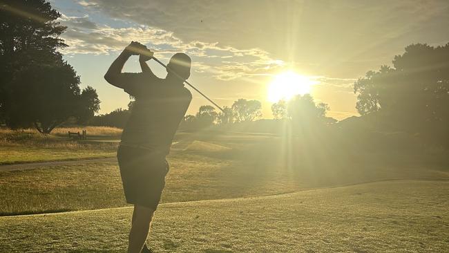 Jon Ralph hits into the sunrise during The Longest Day. Picture: Supplied