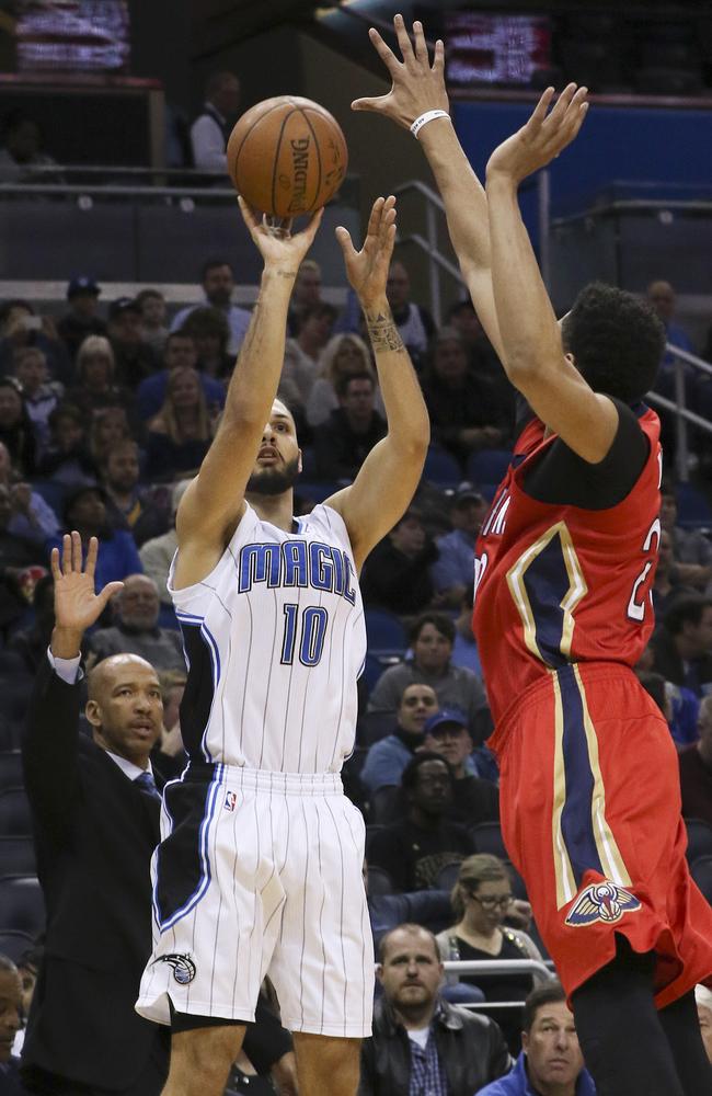 Orlando Magic guard Evan Fournier shoots over New Orleans Pelicans forward Anthony Davis.