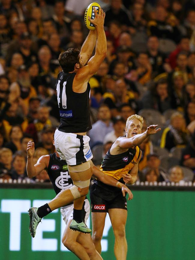 Casboult flying high against the Tigers in Round 1. Picture: Wayne Ludbey