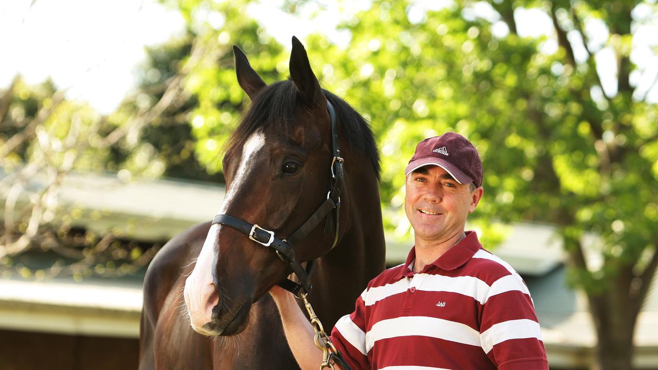 Trainer Craig Carmody with his racehorse No Respite at Randwick in Sydney.