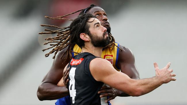 Brodie Grundy competes with Nic Naitanui. Picture: Michael Willson/AFL Photos via Getty Images