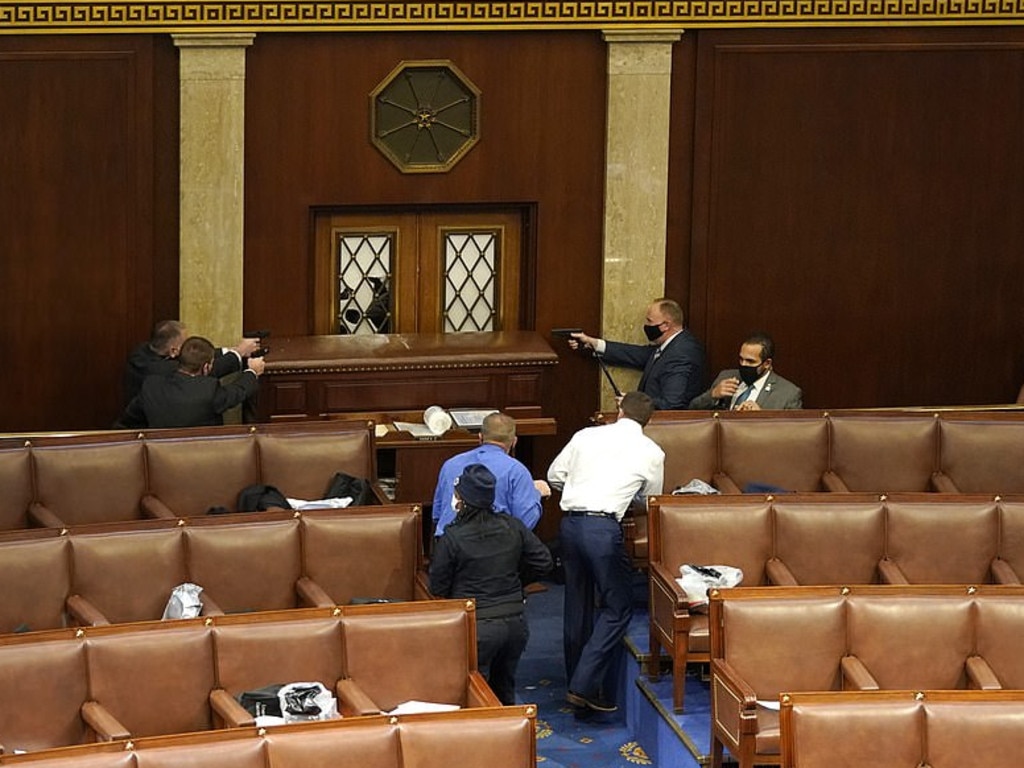 Law enforcement barricade a door to the House Chamber. Picture: Getty Images