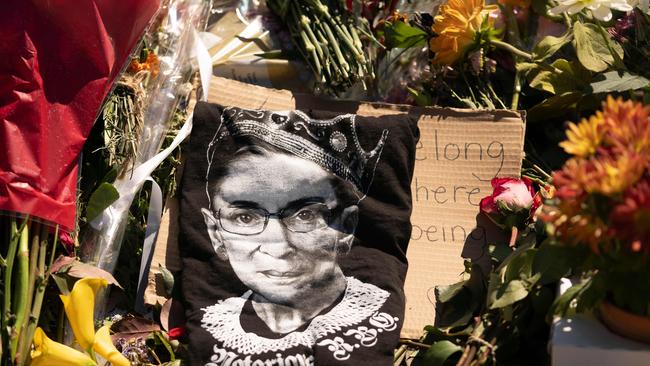 A makeshift memorial for late US Supreme Court Justice Ruth Bader Ginsburg near the steps of the US Supreme Court. Picture; AFP.