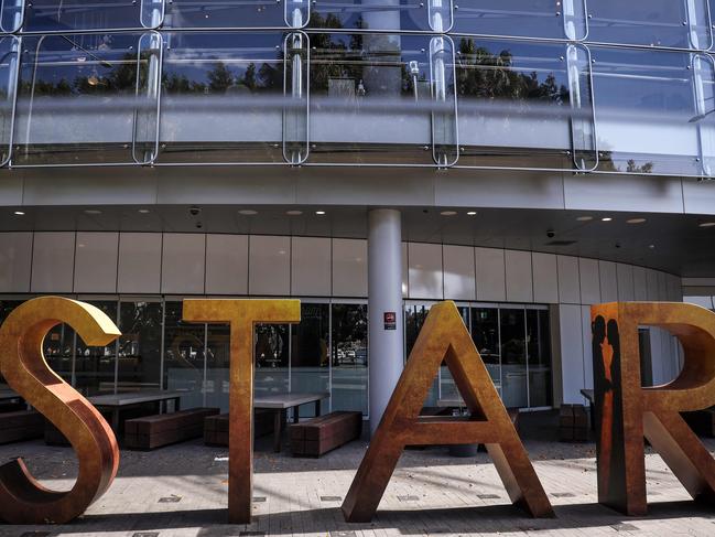 A sign stands outside The Star casino and event centre in Sydney on September 2, 2024. Troubled resort and casino operator Star Entertainment was temporarily delisted from the Australian Securities Exchange on September 2 after failing to post its annual financial results. (Photo by DAVID GRAY / AFP)