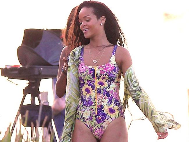 Rihanna in Barbados last year wearing the We Are Handsome Secret Garden Zipsuit.