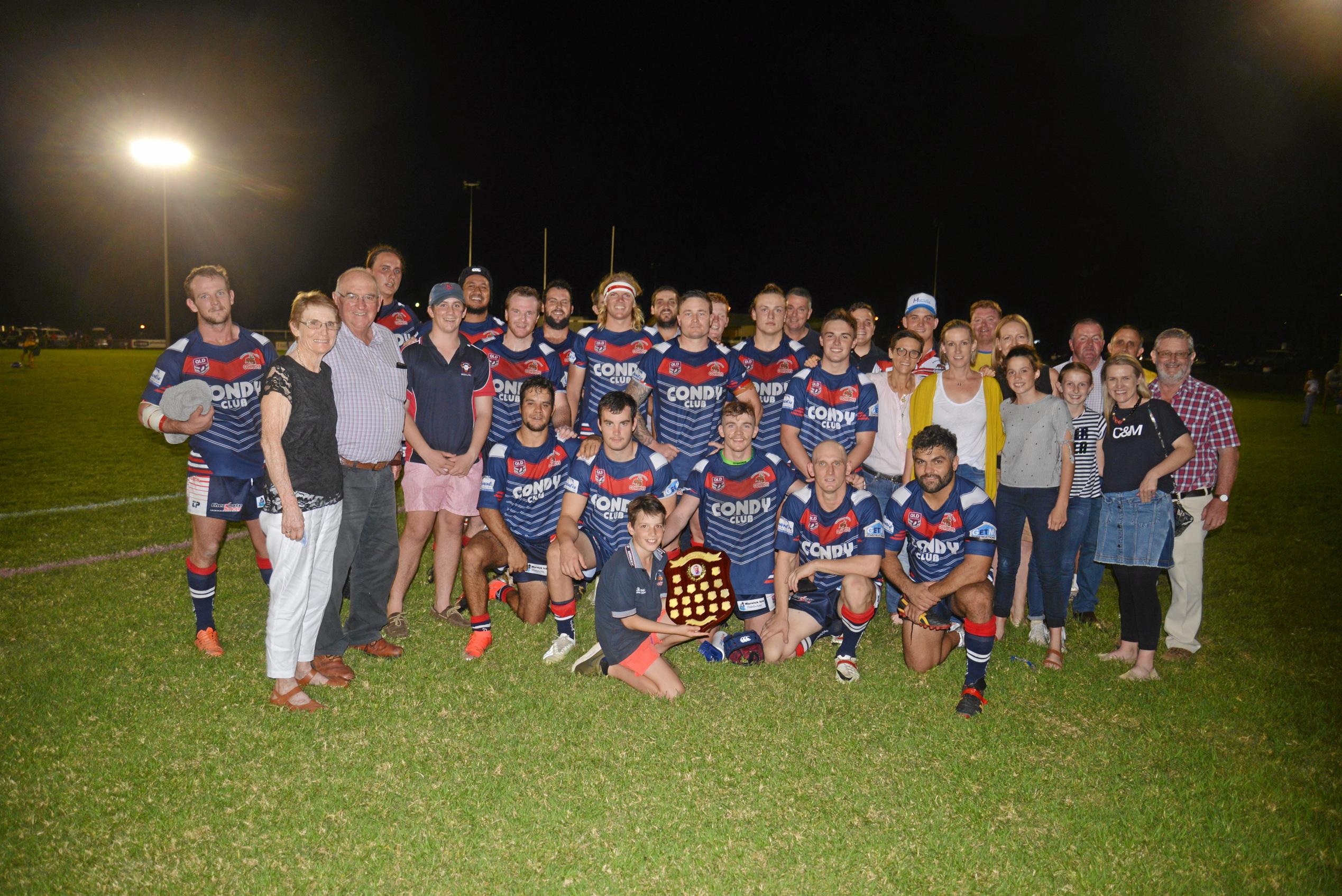 The Warwick Cowboys A-grade side with the Nolan family after winning the inaugural Basil Nolan Memorial Shield at Father Ranger Oval. Picture: Gerard Walsh