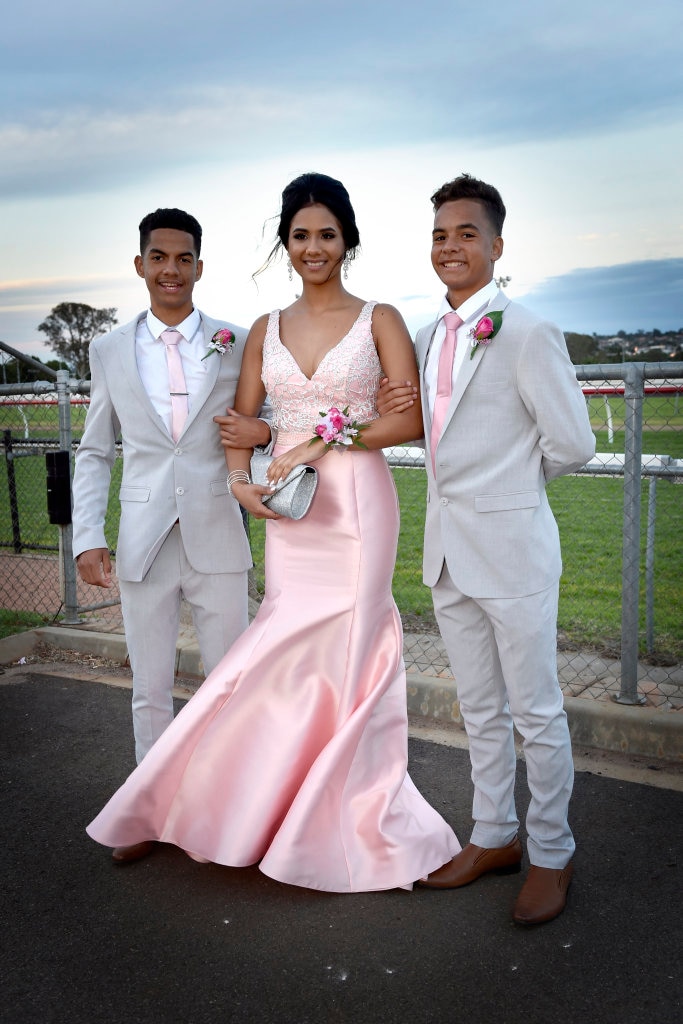 Lottie Beschel and her two brothers, Sigi (left) and Degen. St Saviour's College formal, Toowoomba Turf Club. November 2017. Picture: Bev Lacey