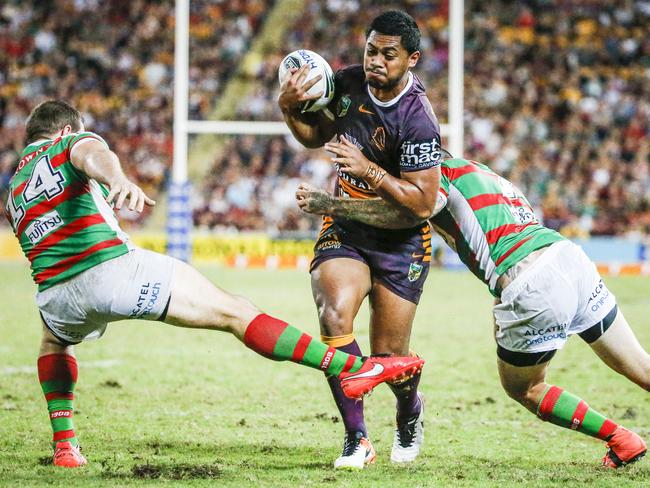 Anthony Milford of the Broncos is tripped by Paul Carter of the Rabbitohs during Round 8 of the NRL match between Brisbane Broncos and South Sydney Rabbitohs at Suncorp Stadium,Brisbane, Friday, April 22, 2016. (AAP Image/Glenn Hunt) NO ARCHIVING, EDITORIAL USE ONLY