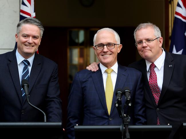 Mathias Cormann, Malcolm Turnbull and Scott Morrison at a press conference just a day before Cormann withdrew his support from the PM. Picture: Kym Smith