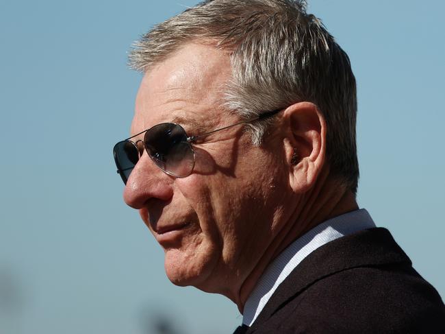 SYDNEY, AUSTRALIA - AUGUST 03: Kris Lees looks on prior to Race 1 Jockeys Appreciation during Sydney Racing at Rosehill Gardens on August 03, 2024 in Sydney, Australia. (Photo by Jeremy Ng/Getty Images)