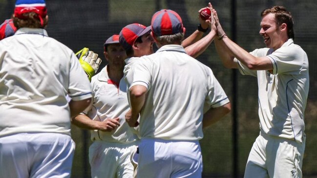 Michael Doe gives a high five to his brother Anthony (right). Picture: Al Dillon