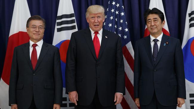 Moon Jae-in, Donald Trump and Shinzo Abe in Hamburg in July. Picture: AP