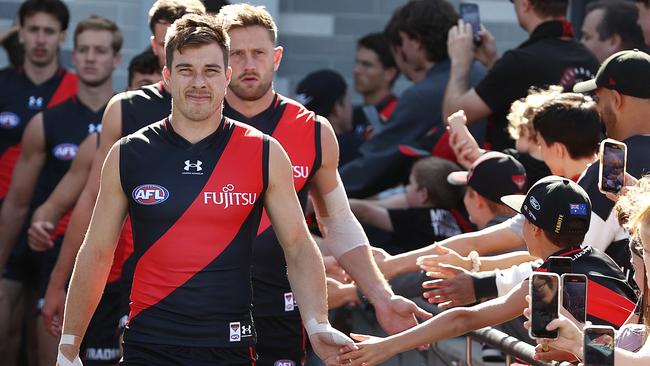 Zach Merrett leads the Bombers out during pre-season. Picture: Michael Klein.