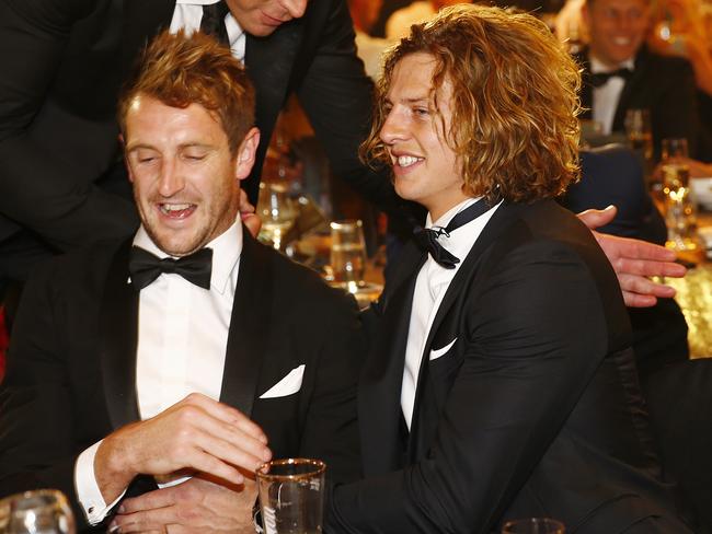 Nat Fyfe is congratulated by Michael Barlow. Picture: Michael Klein