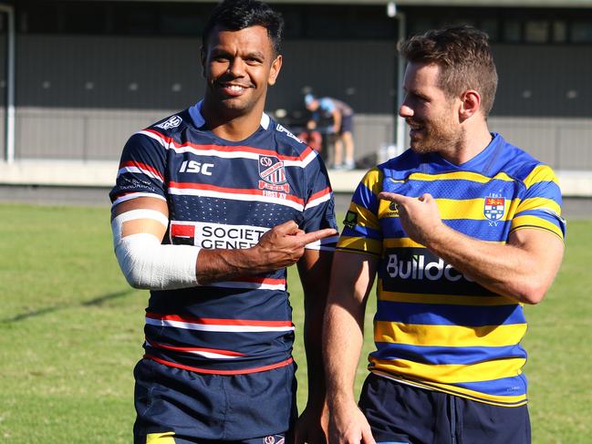 Kurtley Beale and Bernard Foley at Waratahs training in their club jerseys.