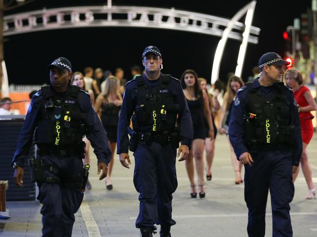 Schoolies Week Story. Police Patrol Cavill Avenue in Surfers Paradise on Friday night before Schoolies flood the area on Saturday. Pic: Lindsay Moller