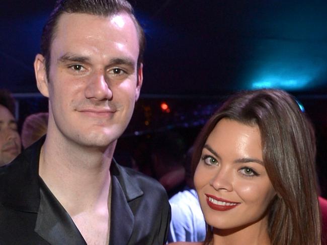 LOS ANGELES, CA - AUGUST 01:  Cooper Hefner (L) and actress Scarlett Byrne attend the annual Midsummer Night's Dream Party at the Playboy Mansion hosted by Hugh Hefner on August 1, 2015 in Los Angeles, California.  (Photo by Charley Gallay/Getty Images for Playboy)