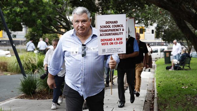 Anti co-ed Newington College parents walking towards the school in a silent protest against the proposed switch. Picture: Richard Dobson