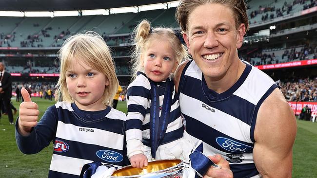 MELBOURNE . 24/09/2022. AFL Grand Final.  Geelong Cats vs Sydney Swans at the MCG.   Rhys Stanley of the Cats and his kids    . Picture by Michael Klein