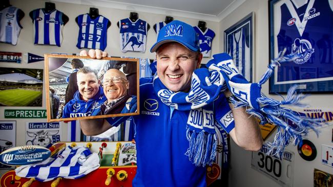 Ross Payne is a huge North Melbourne fan with an amazing set-up of memorabilia in his man-cave. Picture: Nicole Cleary