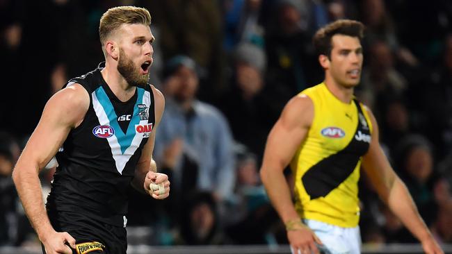 Jackson Trengove put a hard tag on Alex Rance, but the superstar defender was good enough to break it after halftime — with the reassurance of his captain. Picture: Getty Images