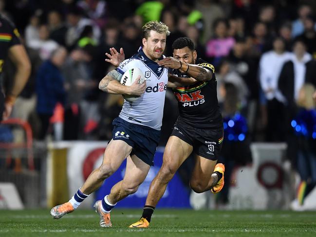 Cameron Munster breaks away from Api Koroisau.