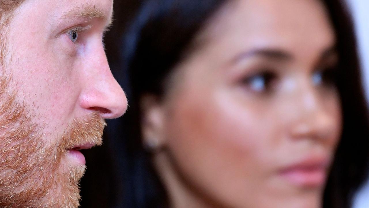 Surely Prince Harry and Meghan Markle are affected by their steep decline in popularity? Picture: TOBY MELVILLE / POOL / AFP