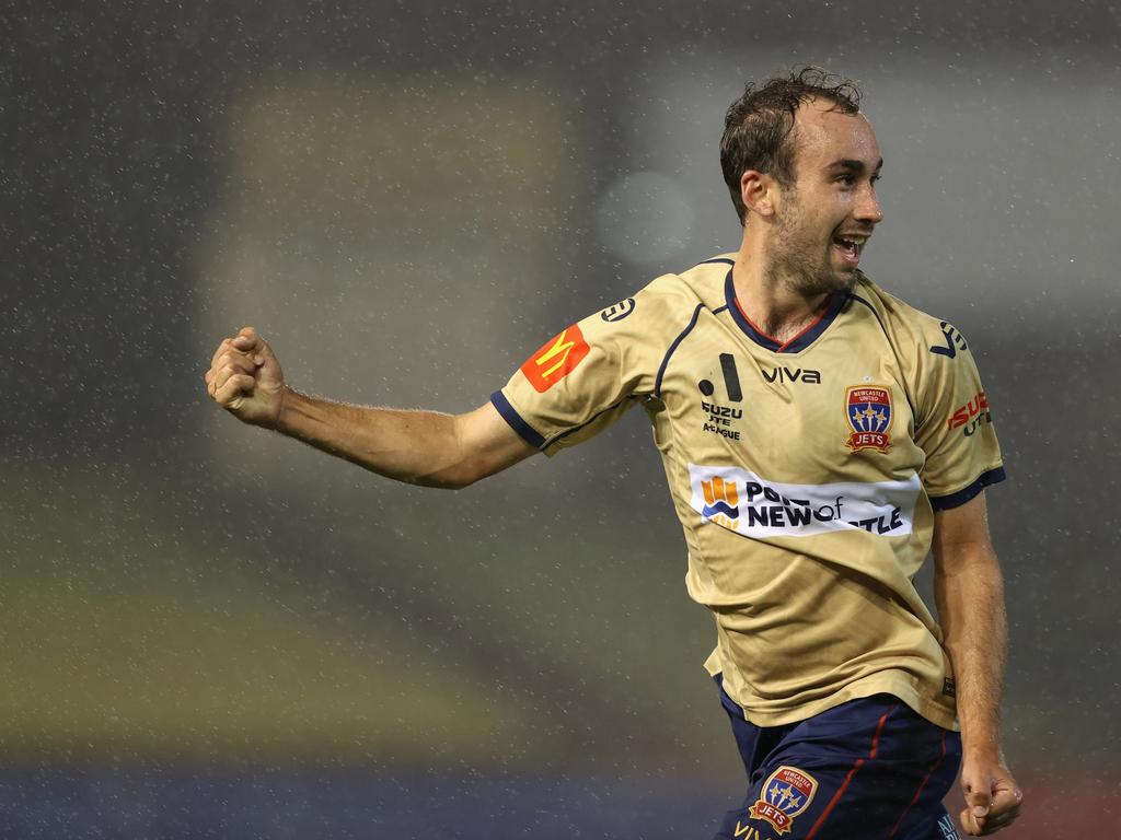 Jets midfielder Angus Thurgate celebrates scoring against Brisbane Roar. Picture: Ashley Feder/Getty Images