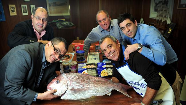 Michael Angelakis, Tom Angelakis, Peter Sperou, Jordan Angelakis and Michael Angelakis in the Angelakis boardroom in Adelaide in 2013.