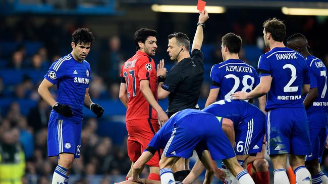 Referee Bjorn Kuipers of the Netherlands shows a straight red card to Zlatan Ibrahimovic.